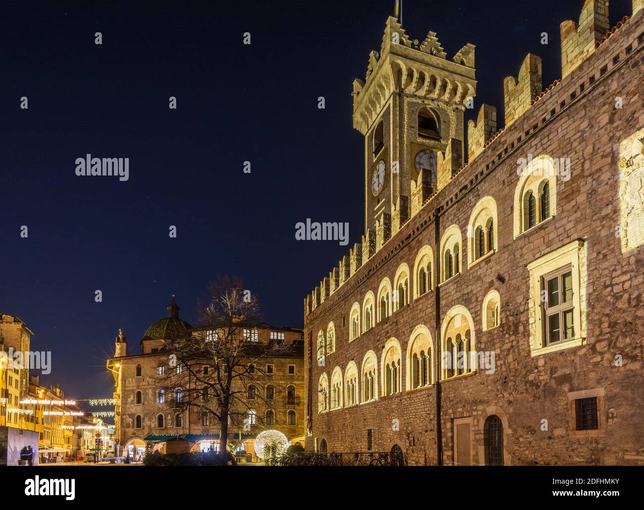 Christmas in Trento with the Christmas lights and decoration. Cathedral of San Vigilio in main square of old town. Trento, Trentino Alto Adige,Italy Stock Photo