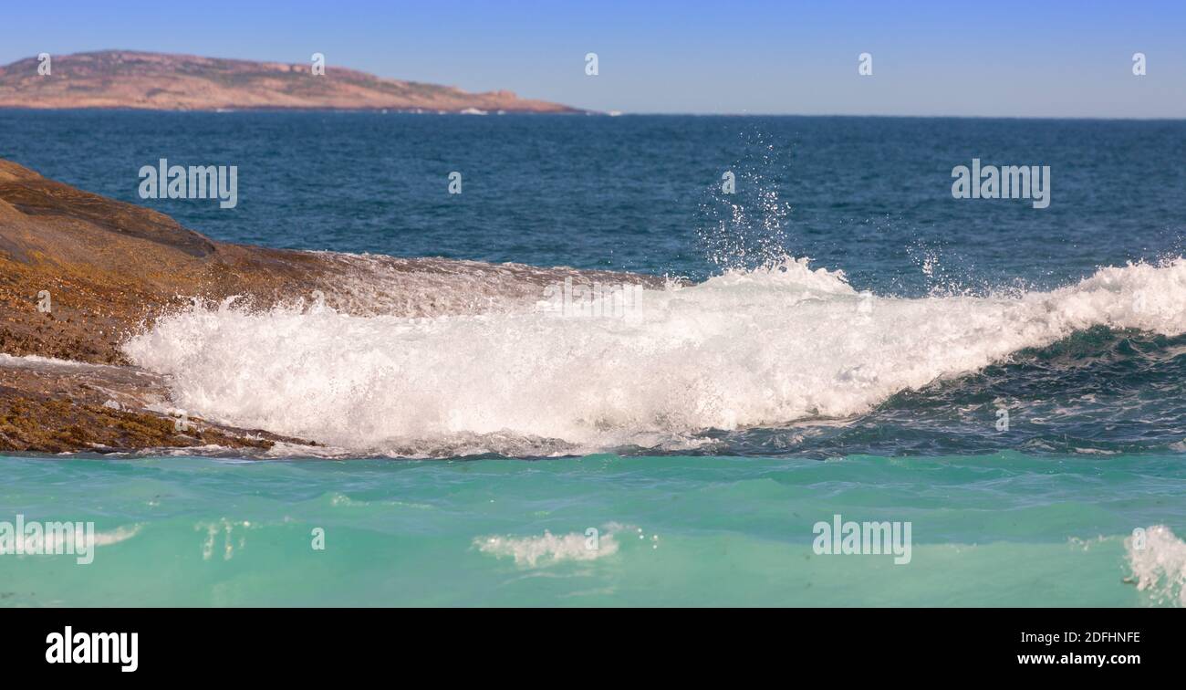 Oncoming waves at the Shore of the Hellfire Bay in the Cape Le Grand Nationalpark close to Esperane in Western Australia Stock Photo