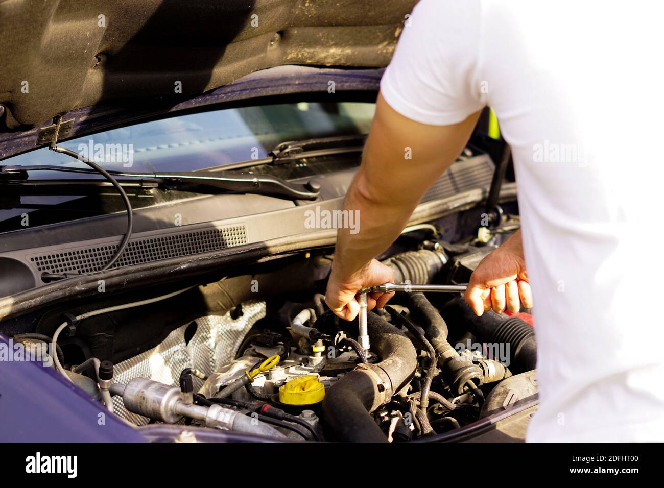 repairman is checking the car engine Stock Photo