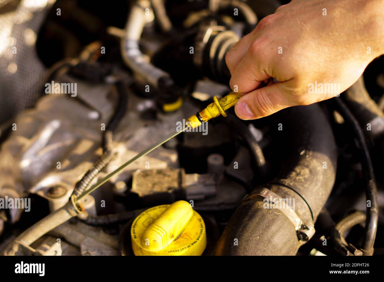 Checking the oil level of the car engine Stock Photo