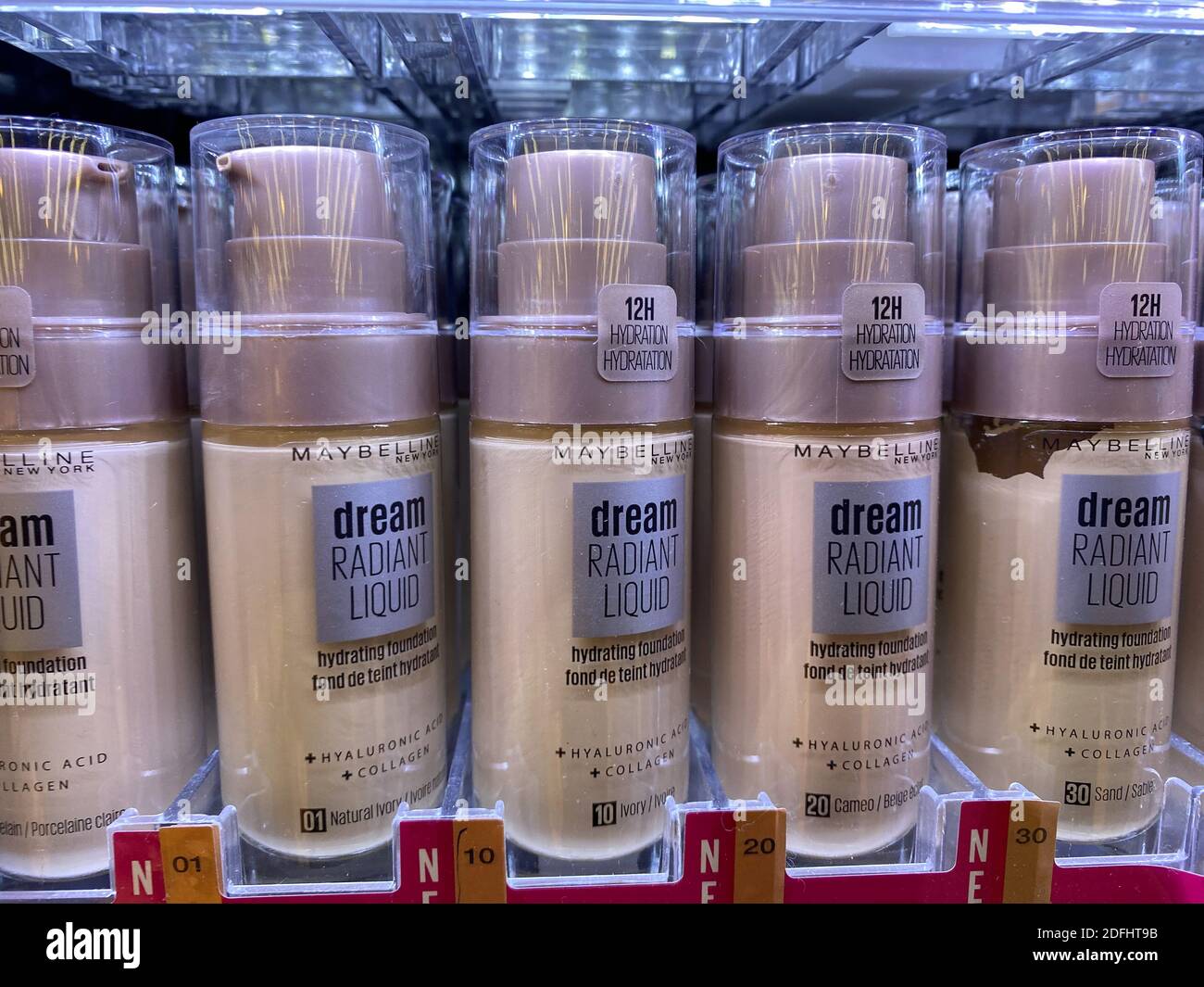 Viersen, Germany - May 9. 2020: Closeup of bottles Maybelline dream radiant liquid in shelf of german supermarket Stock Photo