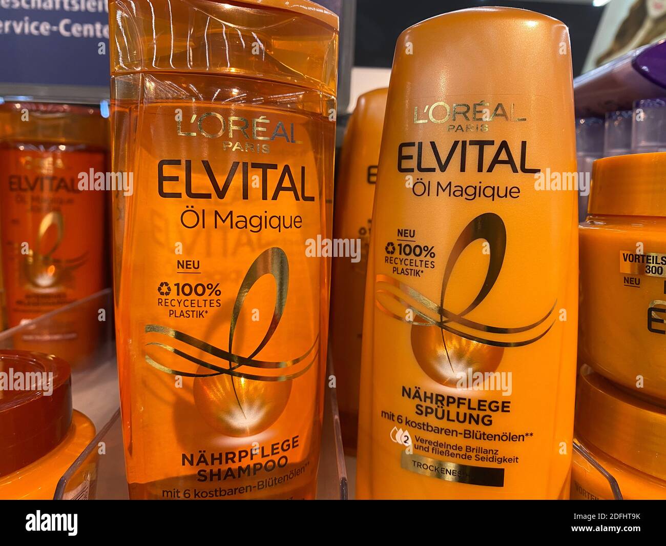 Viersen, Germany - May 9. 2020: Closeup of bottles loreal Elvital shampoo in shelf of german supermarket Stock Photo