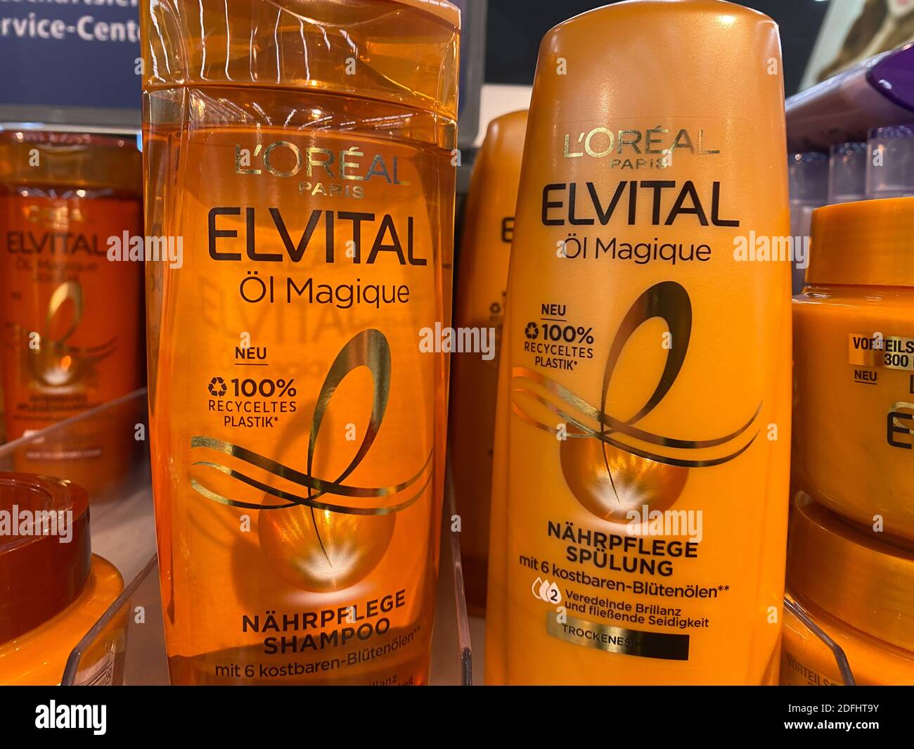 Viersen, Germany - May 9. 2020: Closeup of bottles loreal Elvital shampoo in shelf of german supermarket Stock Photo