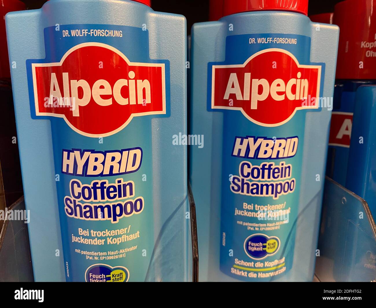 Viersen, Germany - May 9. 2020: Closeup of bottles Alpecin caffeine  dandruff shampoo in shelf of german supermarket Stock Photo - Alamy