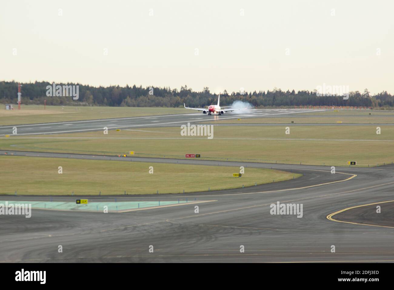 Landing airplane Stock Photo