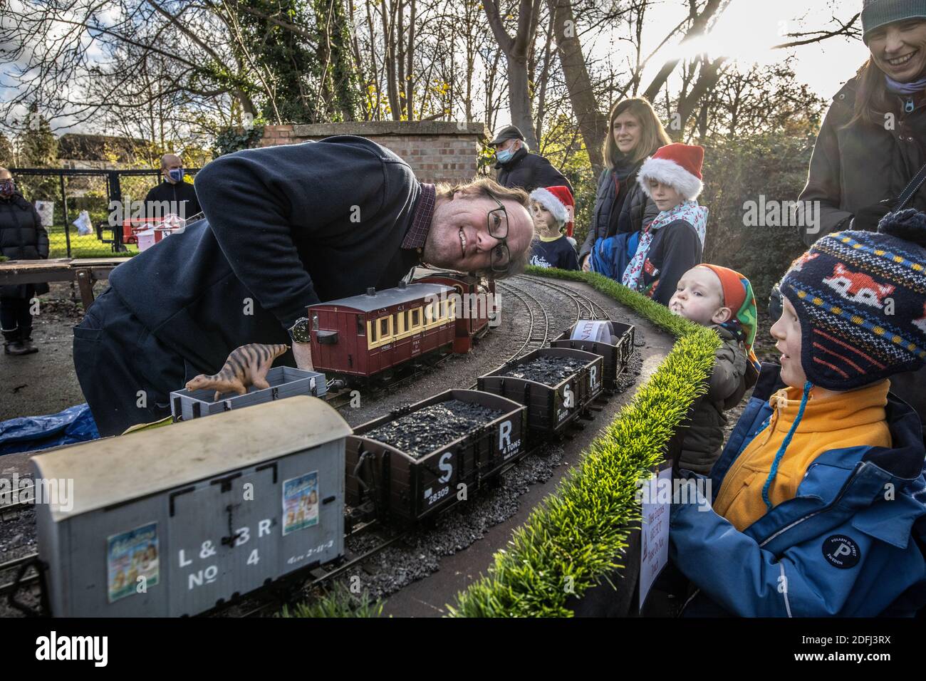Southwest London, UK. 5th Dec 2020. Model Railway enthusiasts gather for festive train experience, Southwest London, UK 05th December 2020 People were able to go out and enjoy watching steam model railway locomotives on a bright and sunny winters day in Merton park, London, England, UK Credit: Clickpics/Alamy Live News Stock Photo