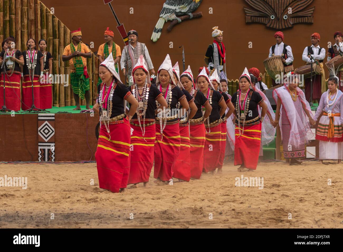 Selective focus image of Traditional tribal folk dance of Tripura being performed at Kisama India on 2 December 2016 Stock Photo