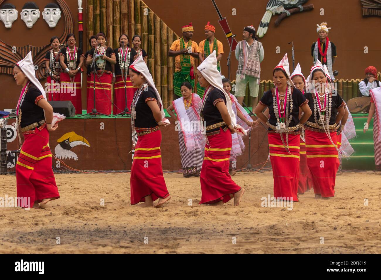 Selective focus image of Traditional tribal folk dance of Tripura being performed at Kisama India on 2 December 2016 Stock Photo