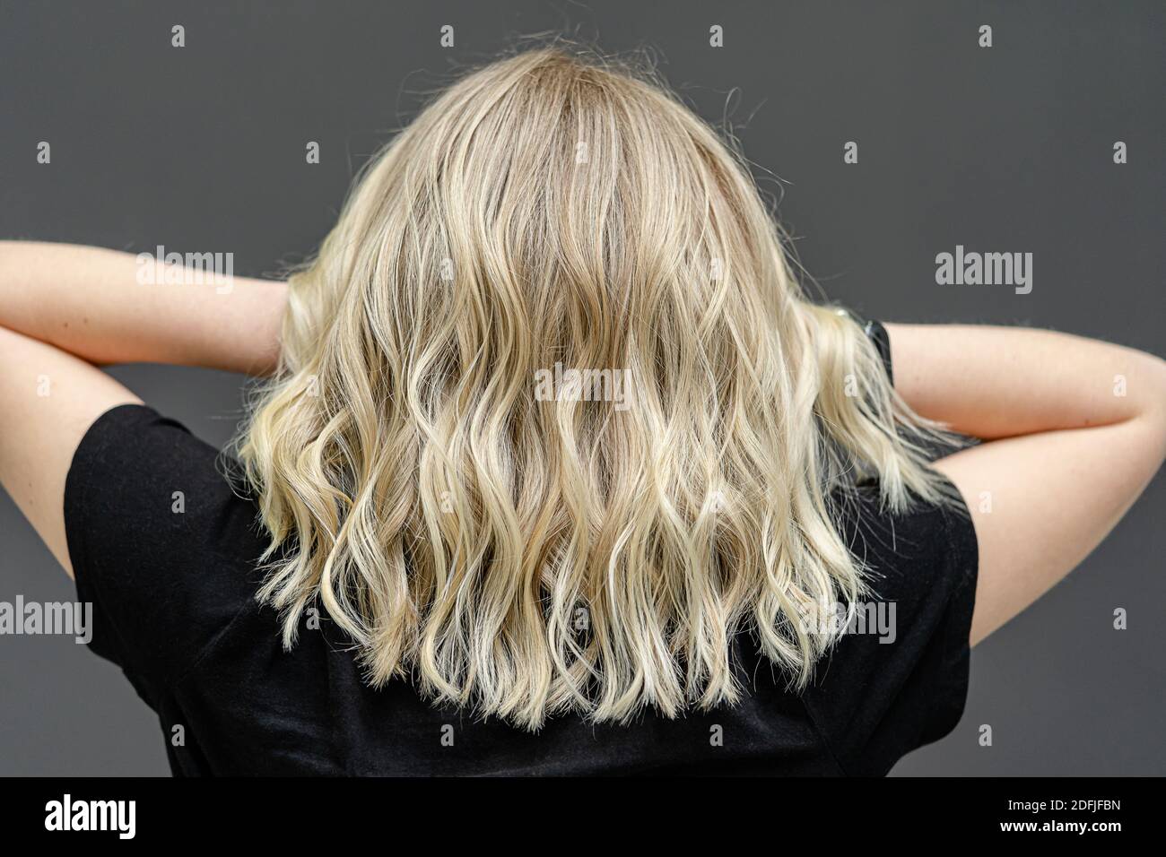 Modern trendy shatush technique for hair dyeing. Look from behind Stock Photo