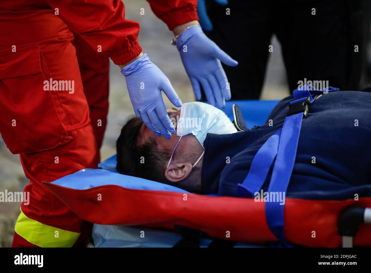 Bucharest, Romania - December 5, 2020: Paramedics from the Romanian Ambulance (SMURD) exercise the rescue of a car crash victim. Stock Photo