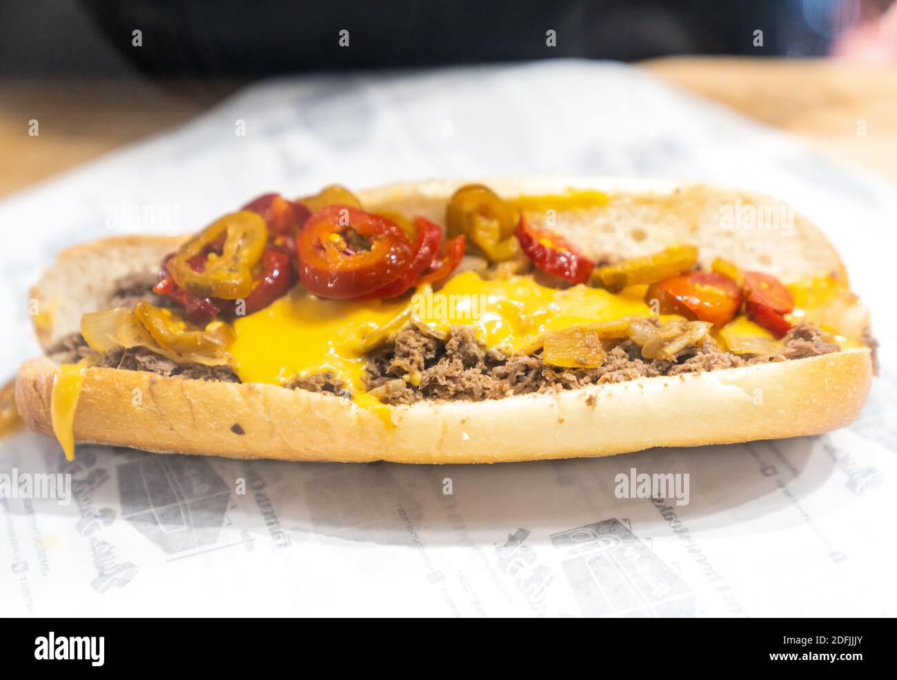 Chef Prepares a Cheesesteak Sandwich in Philadelphia. Stock Photo