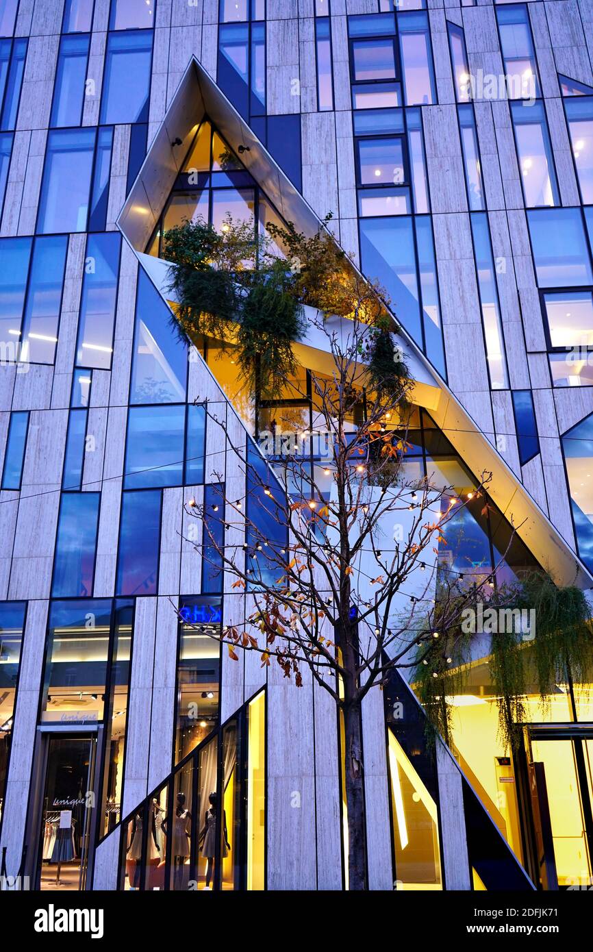 Close-up detail of a building in the 'Kö-Bogen' complex in downtown Düsseldorf with Christmas illumination. Architect: Daniel Libeskind. Stock Photo