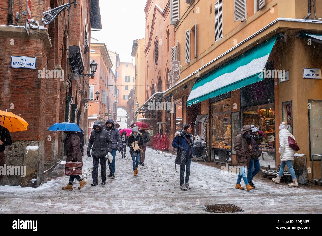 Snow falling in the streets of the historic centre of Bologna, Italy Stock Photo Alamy
