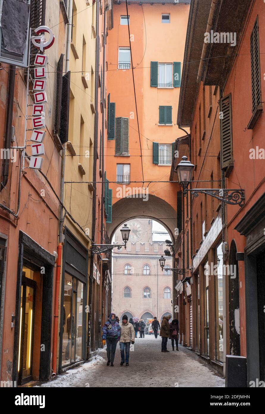 Snow in the historical streets of central Bologna, Italy, with a view ...