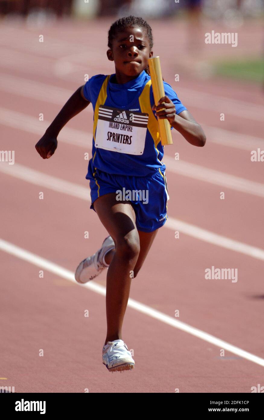 Carson, United States. 22nd May, 2005. A female youth runner competes in  the 400-meter relay in the adidas Track Classic at the Home Depot Center in  Carson, Calif. on Sunday, May 22,