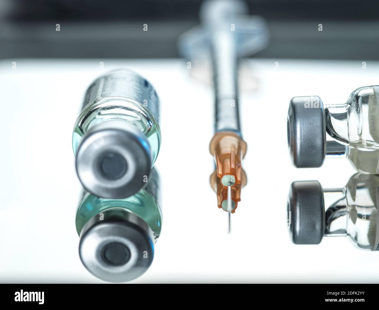 Vaccine and syringe Stock Photo