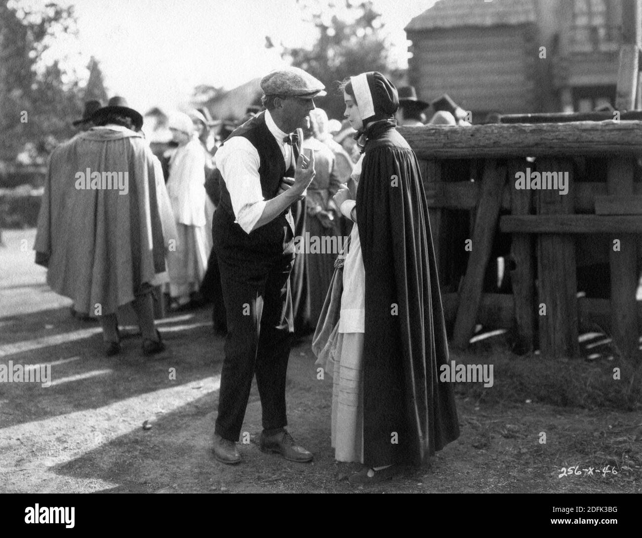 Director VICTOR SEASTROM and LILLIAN GISH as Hester Prynne on set candid during filming of THE SCARLET LETTER 1925 director VICTOR SEASTROM / SJOSTROM novel Nathaniel Hawthorne adaptation and titles Frances Marion costume design Max Rée Metro Goldwyn Mayer Stock Photo