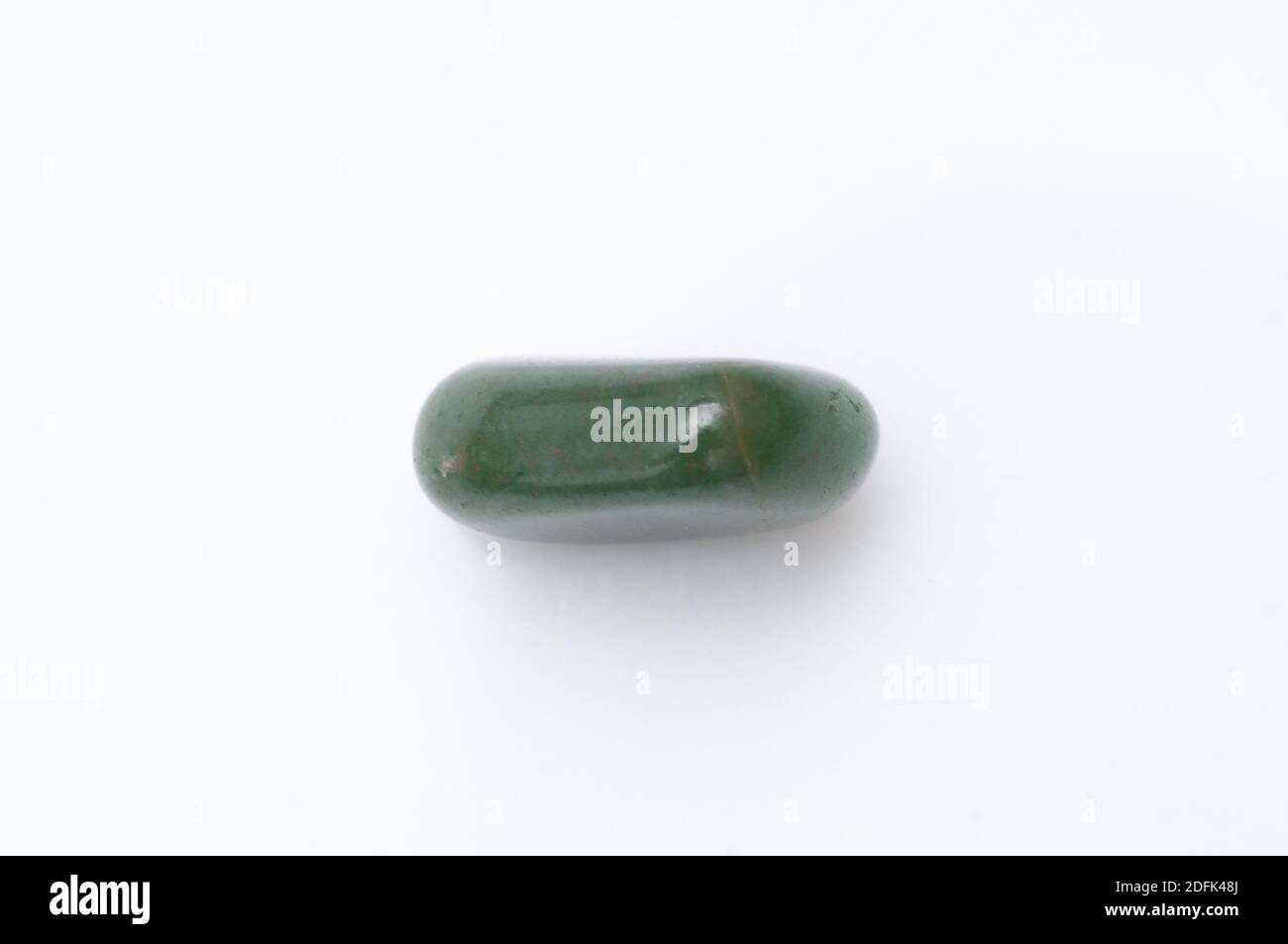 Natural stone aventurine on a white background Stock Photo - Alamy