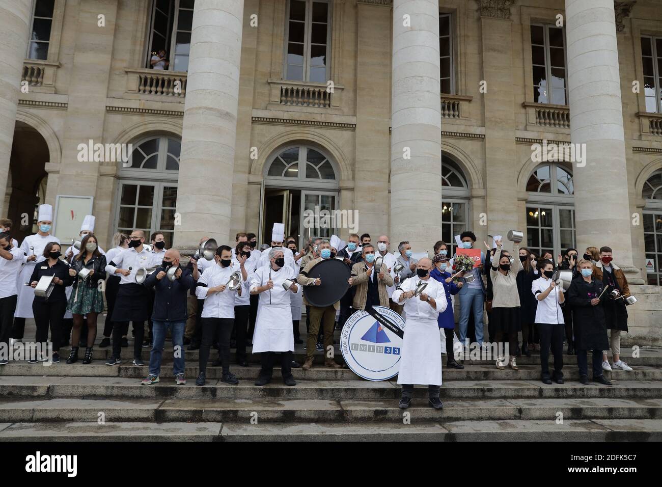 French chef Philippe Etchebest makes noise with his employees wearing a black armbands outside his restaurant 'Le Quatrieme Mur' in Bordeaux, on October 2, 2020, to protest after French government imposed fresh curbs to limit the spread of the Covid-19 diseases caused by the novel coronavirus. Photo by Thibaud Moritz/ ABACAPRESS.COM Stock Photo