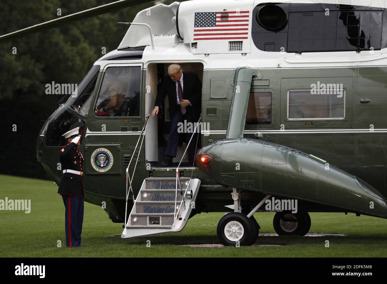 U.S. President Donald Trump returns to the White House in Washington ...