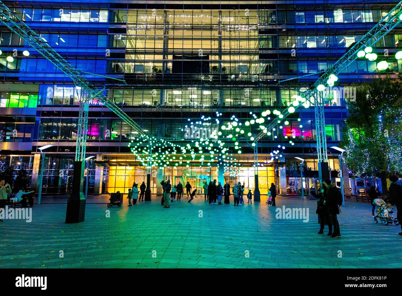 5 December 2020 - London, UK, Connected by Light curated light art installations on display, Murmuration by Squidsoup in Canary Wharf Stock Photo