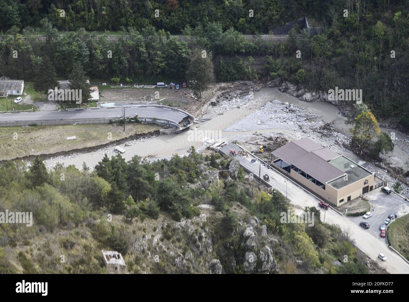 The wreckage of a damaged bridge in Tende, in the Vallee de la Roya, some 50kms north-east of Nice, southeastern France, on October 7, 2020, after storms and extensive flooding caused widespread damage in the Alpes-Maritimes departement. Intense flooding hammered southeast France over the weekend of October 2, causing four confirmed deaths in France and two in Italy, with the toll expected to rise further as searches continue for survivors. Hundreds of people have been evacuated after storms dumped huge amounts of rain that turned streams into churning torrents that swept away cars, houses and Stock Photo