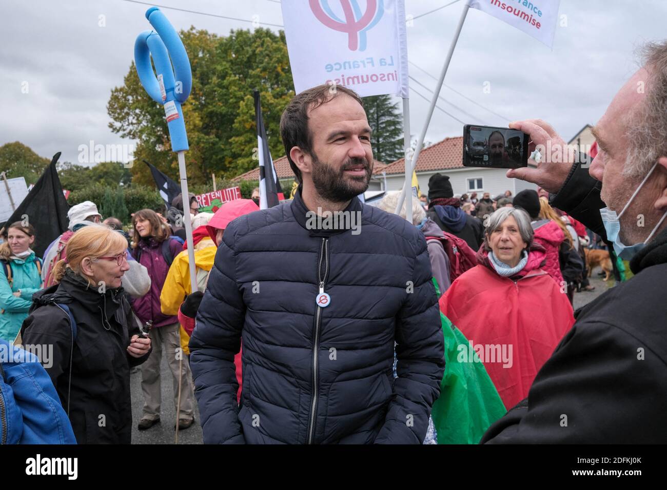 La France Insoumise (LFI) MEP Emmanuel Bompard joins protesters on October 11, 2020, in Lannemezan, southern France, during a demonstration against a mega-sawmill project of Italian group Florian, to be set up in the municipality. Around 1000 people protested to protest against the mega-sawmill project presented last December, judging its production volume to be 'excessive'. The sawmill would require a supply of 50,000 m3 of lumber per year, from an operating area covering several departments in the Pyrenees. Photo by Patrick Batard/ABACAPRESS.COM Stock Photo