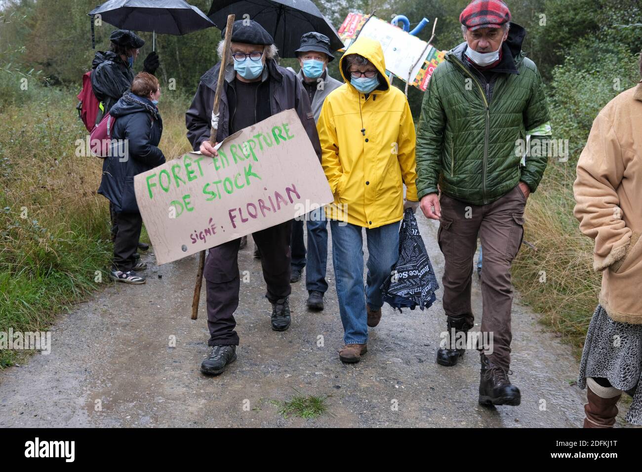 Protesters brave the rain on October 11, 2020, in Lannemezan, southern France, during a demonstration against a mega-sawmill project of Italian group Florian, to be set up in the municipality. Around 1000 people protested to protest against the mega-sawmill project presented last December, judging its production volume to be 'excessive'. The sawmill would require a supply of 50,000 m3 of lumber per year, from an operating area covering several departments in the Pyrenees. Photo by Patrick Batard/ABACAPRESS.COM Stock Photo