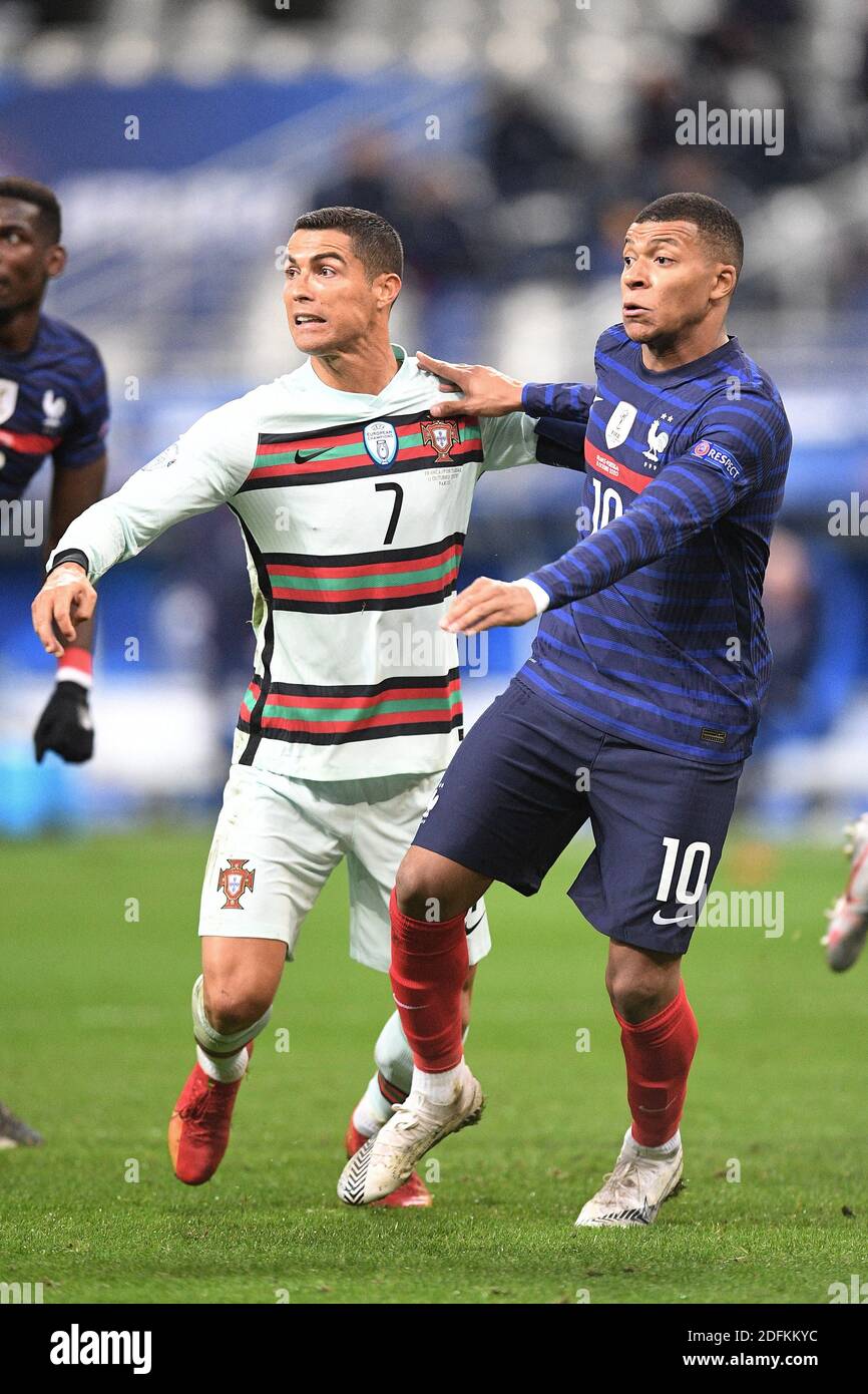 Cristiano Ronaldo of Portugal and Kylian Mbappe of France fin action during  the UEFA Nations League group stage match between France and Portugal at  Stade de France, on October 11, 2020 in