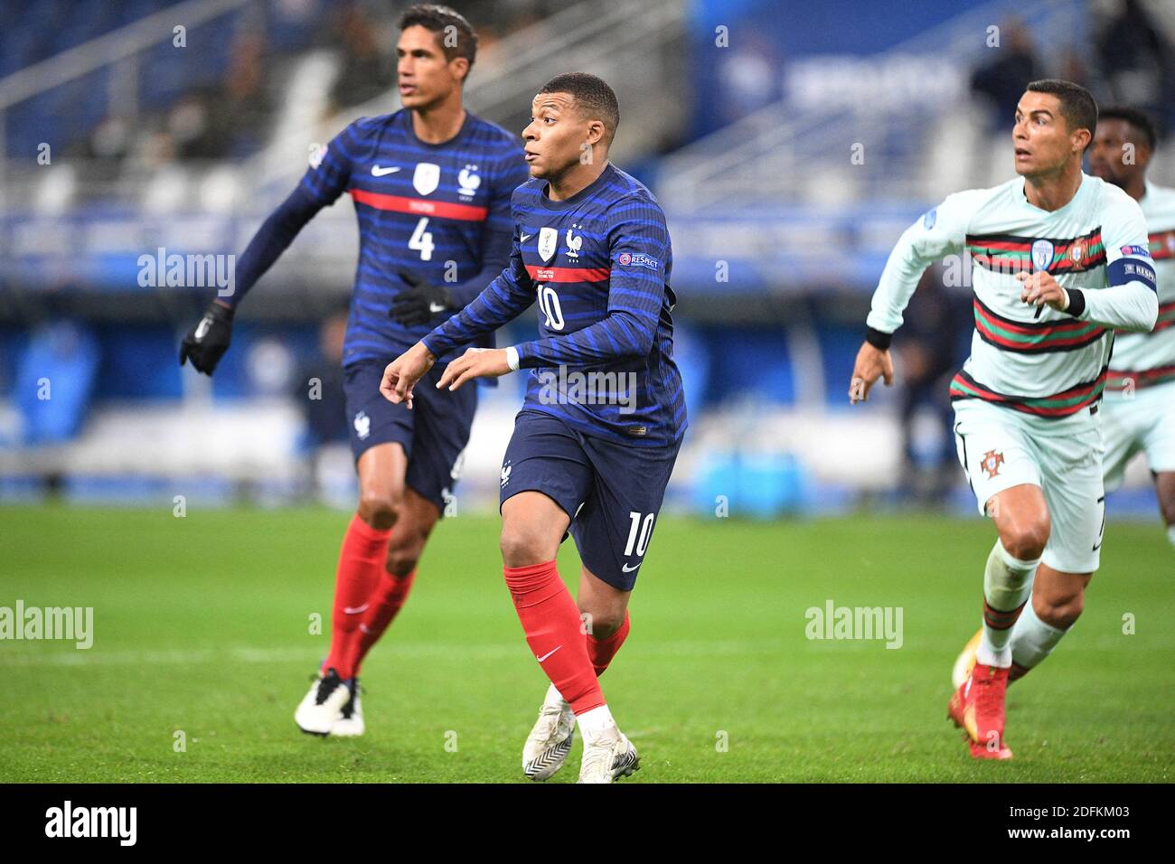 Cristiano Ronaldo of Portugal and Kylian Mbappe of France fin action during  the UEFA Nations League group stage match between France and Portugal at  Stade de France, on October 11, 2020 in