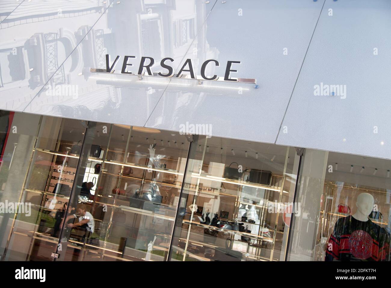 A shop sign of VERSACE, on October 13, 2020 in Cannes, France. Photo by ...