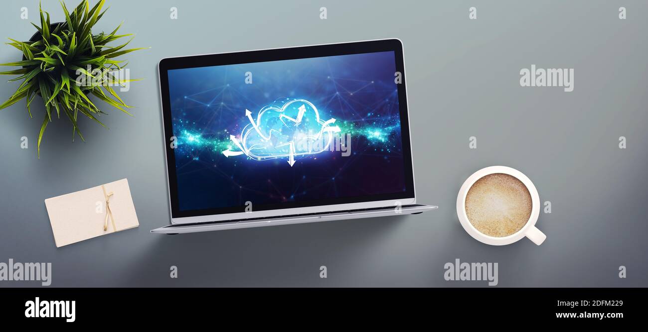 computer showing a cloud with a world map floating in front an abstract grid pattern Stock Photo