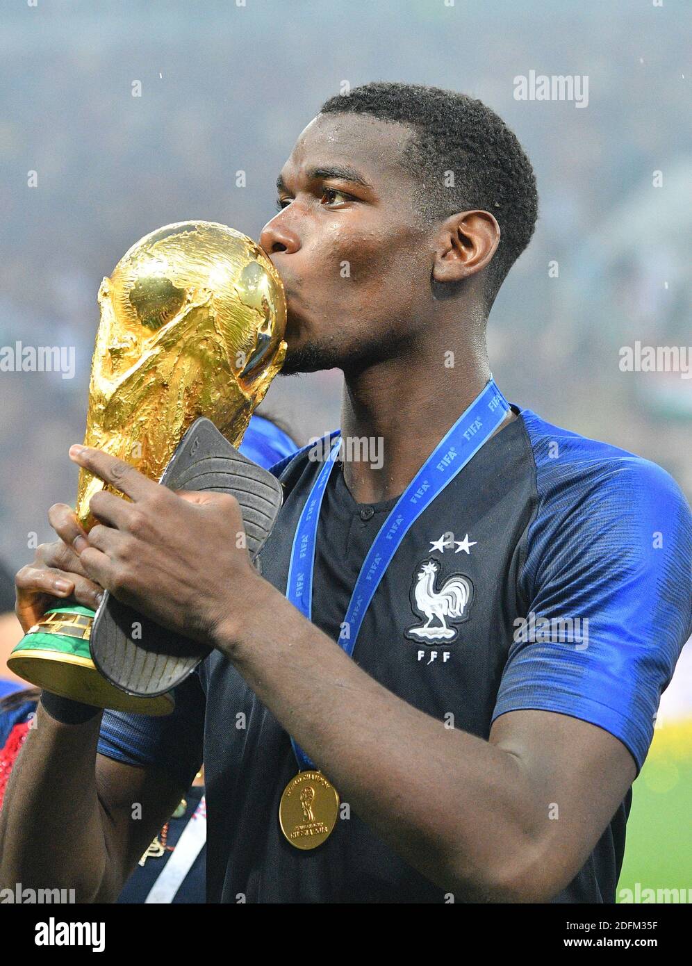 File photo dated July 15, 2018 of France's Paul Pogba kisses the trophy  after winning 4-2 the 2018 FIFA World cup final football match France v  Croatia at Luzhniki stadium in Moscow,