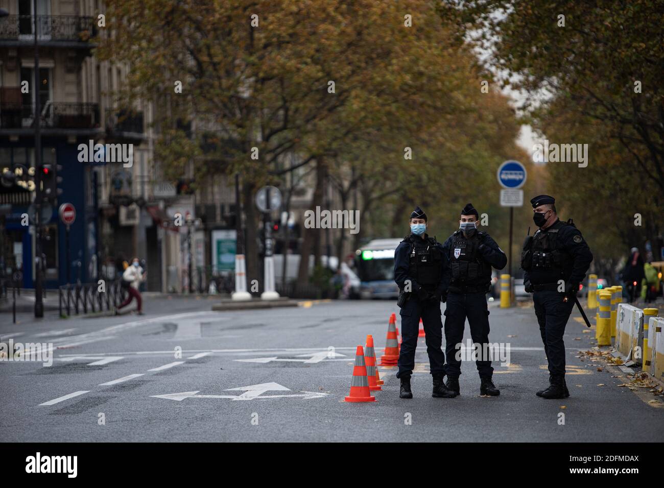Paris Police Document Police officers check travel documents (attestations de deplacement) on ...