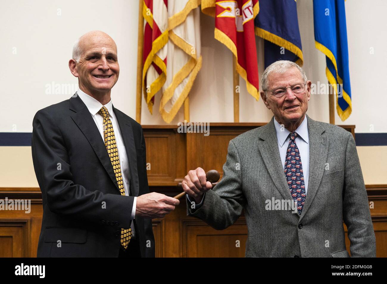 Leaders of the House and Senate Armed Services Committees Congressman Adam Smith (L) and Senator James Inhofe (R) participate in a ceremonial gavel passing in the Rayburn House Office Building in Washington, DC, USA, November 18, 2020. Photo by Bonnie Cash/Pool/ABACAPRESS.COM Stock Photo