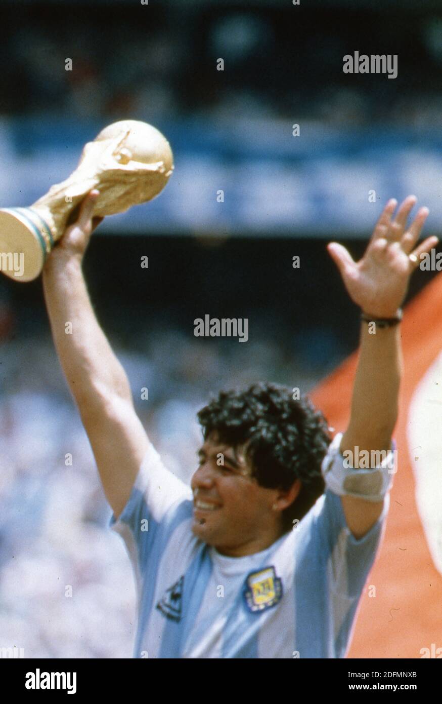 File photo dated June 29, 1986 of Argentine soccer star team captain Diego Armando Maradona displays the World Soccer Cup won by his team after a 3-2 victory over West Germany at the Azteca Stadium in Mexico City. Diego Maradona has died from a heart attack just days after turning 60. The Argentinian football legend died at home, his lawyer said, just two weeks after having surgery on a blot clot in his brain. Widely regarded as one of the greatest players of all time on the pitch, his life off the pitch was equally notorious - amid battles with drug and alcohol addiction. Photo by Giuliano Be Stock Photo