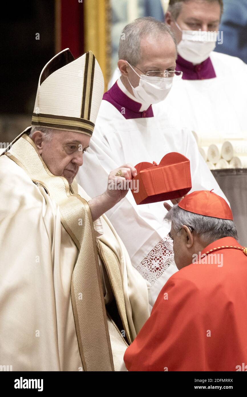 New Cardinal Marcello Semeraro (Italy) receives the red biretta hat from  Pope Francis during a Consistory Ceremony to create 13 new Cardinals in  Saint Peter's Basilica, Vatican on November 28, 2020. Pope