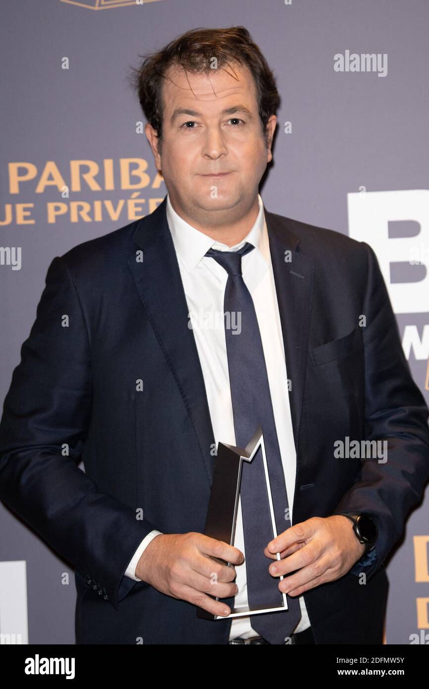 Chairman of Biomerieux, Alexandre Merieux poses after receiving the