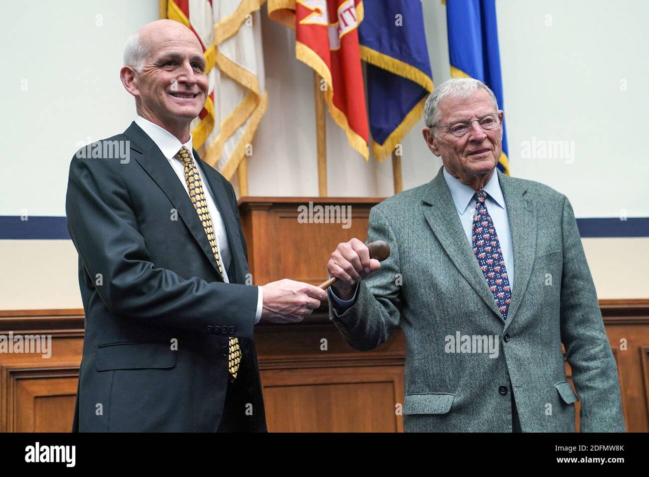House Armed Services Chairman Adam Smith Washington (D-Wash) ceremoniously passes over the gavel to Senate Armed Services Committee Chairman James Inhofe (R-Okla.) during a photo op at the Capitol on Wednesday, November 18, 2020 in Washington, DC, USA. Photo by Bonnie Cash/Pool/ABACAPRESS.COM Stock Photo