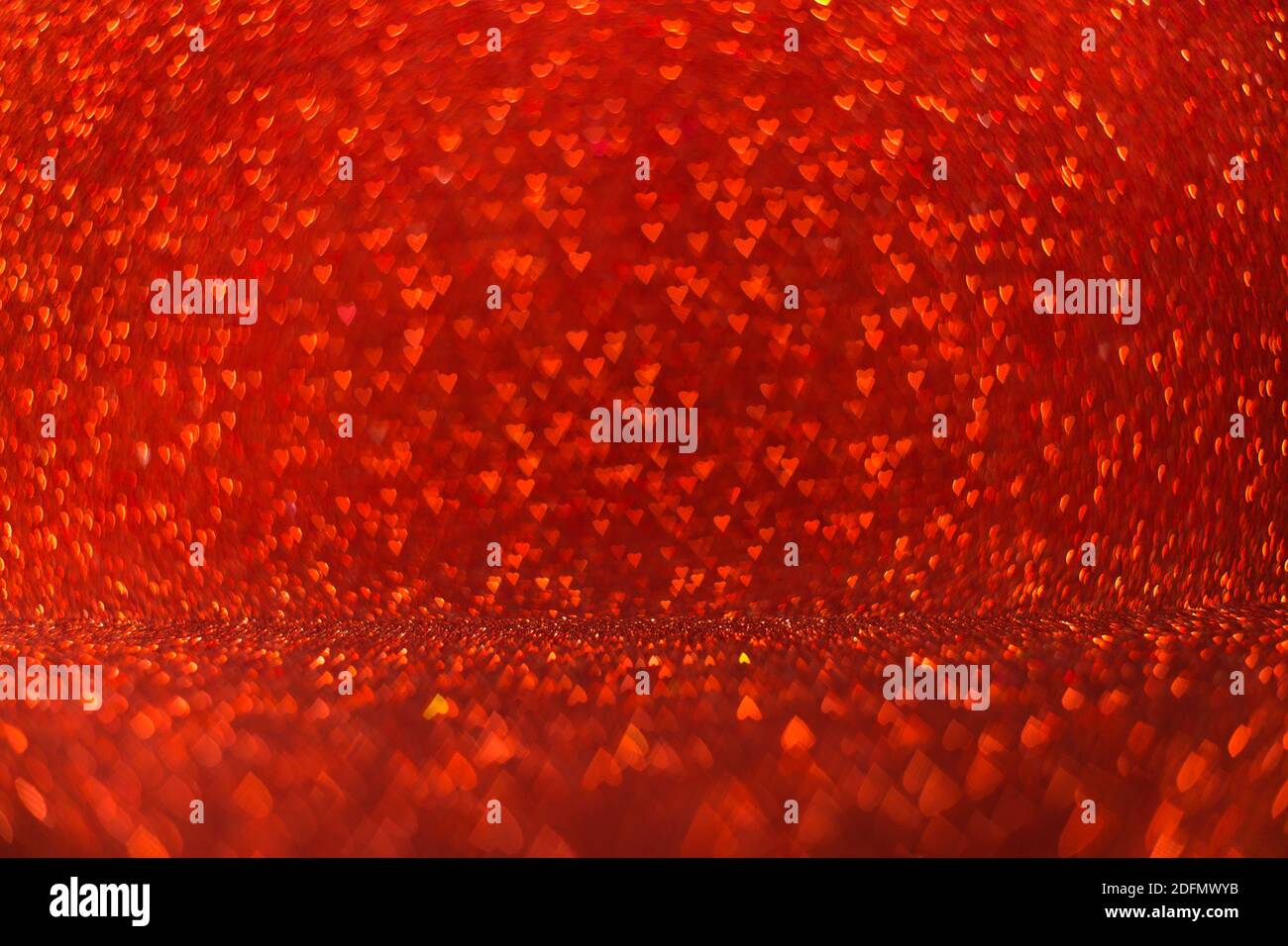 Red abstract glitter unfocused background with heart-shaped bokeh ...