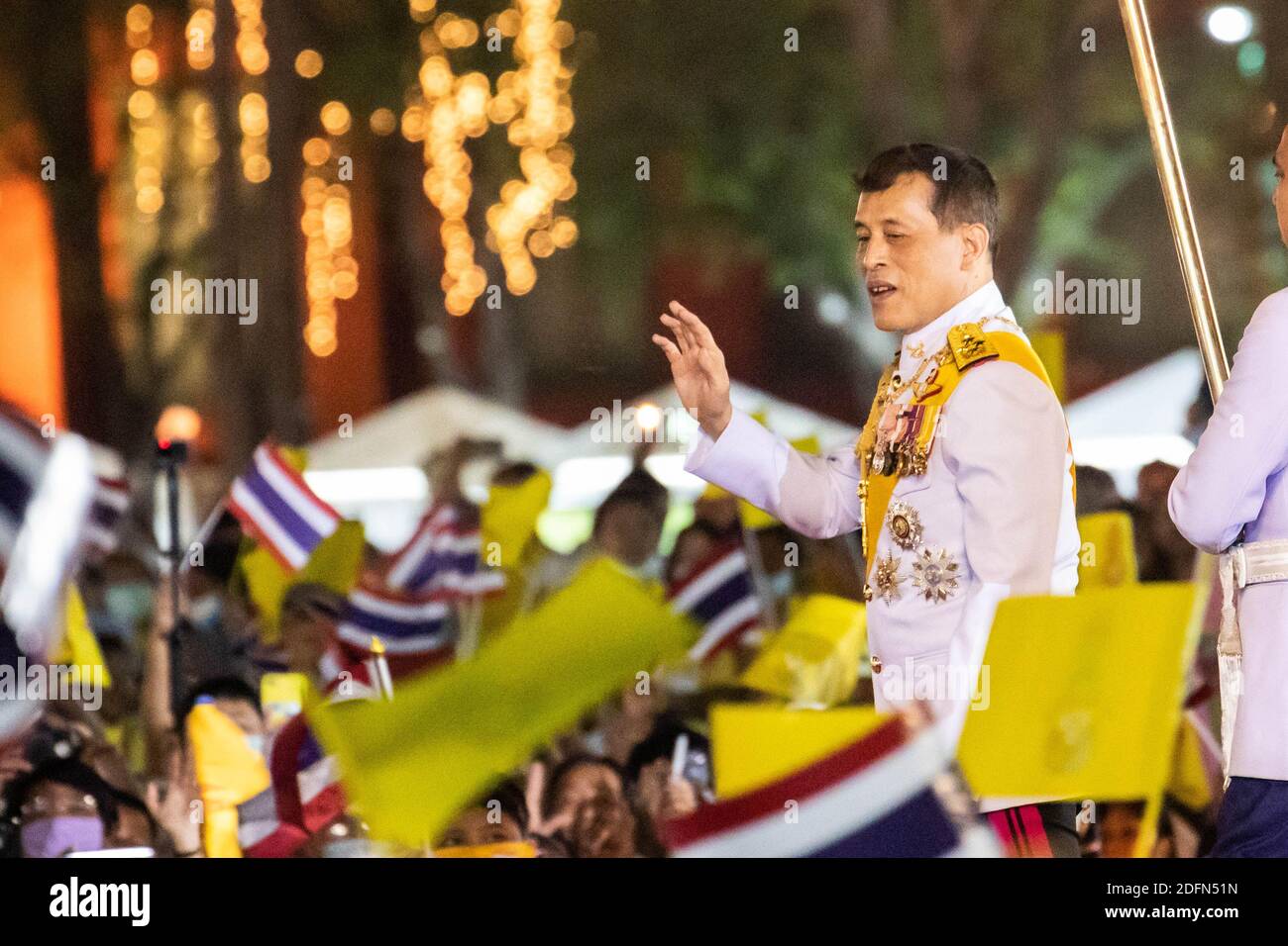 Bangkok, Thailand. 05th Dec, 2020. Thailand King Maha Vajiralongkorn (Rama  X) waves to royalist supporters in front of the Grand Palace at Sanam Luang  during a ceremony to celebrate the birthday of