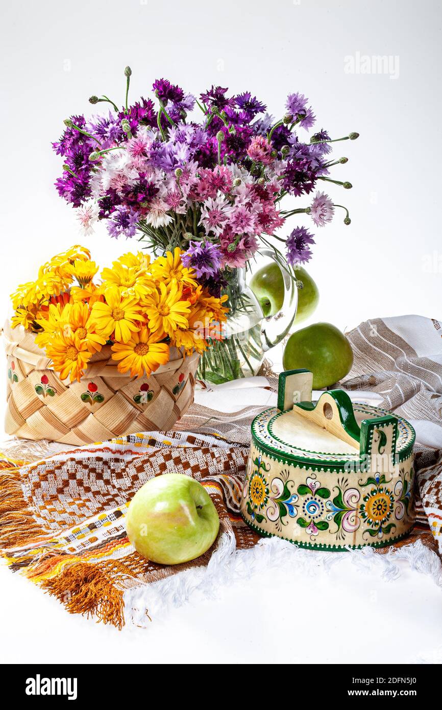 Handmade artworks and flowers on a studio background Stock Photo - Alamy