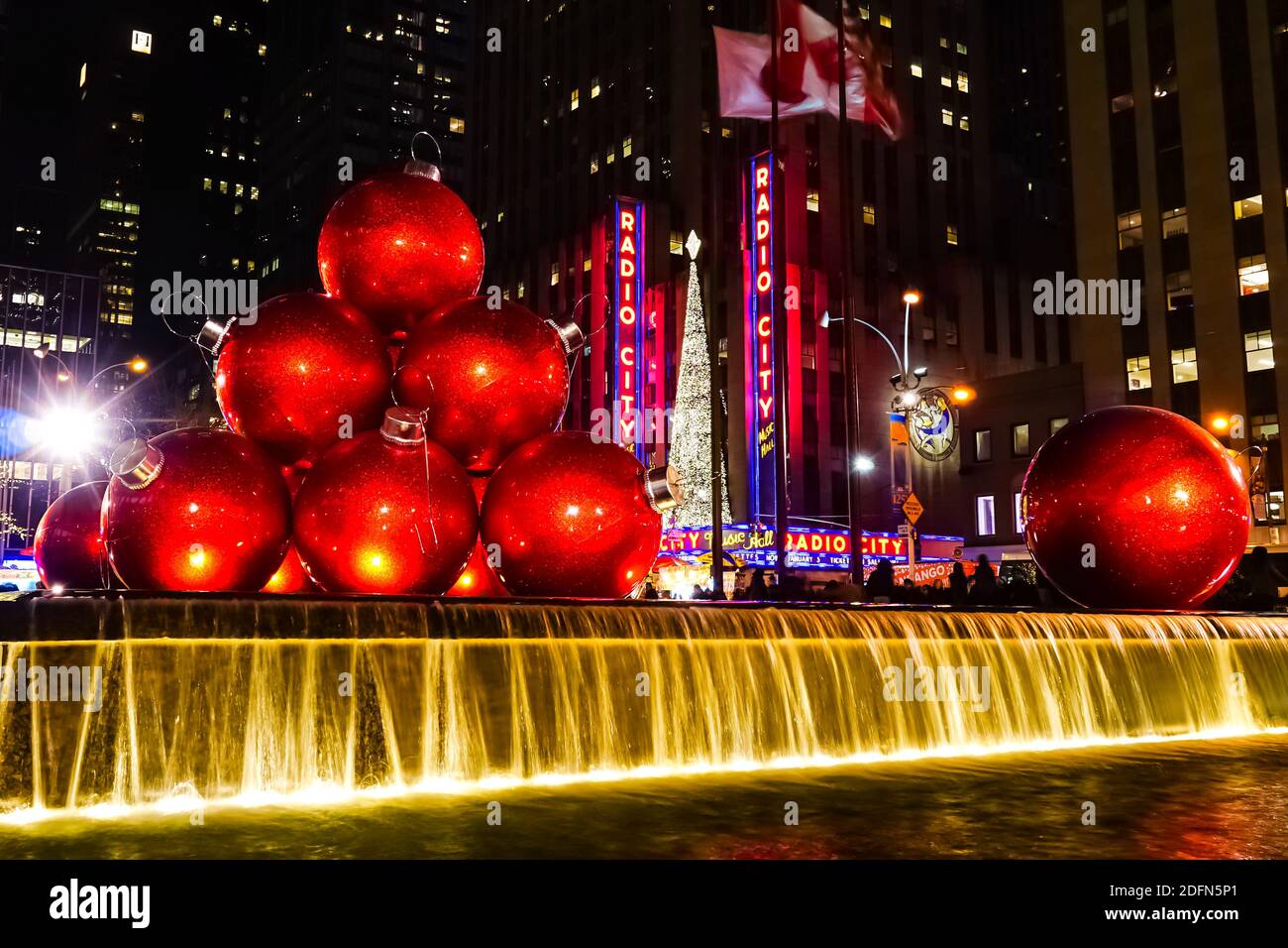 Christmas Holiday decorations in New York City with Radio City Music Hall  Christmas Tree in the background. New York, USA Stock Photo - Alamy