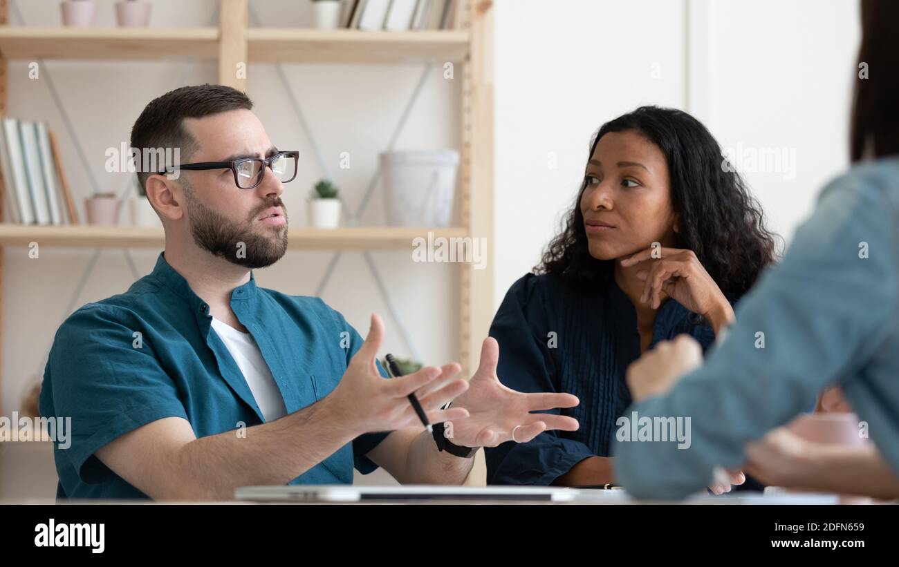 Banner view of multiracial colleagues brainstorm at meeting Stock Photo ...