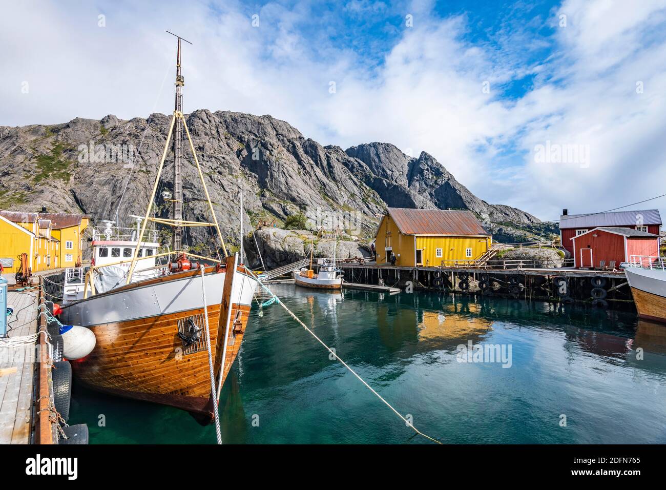 Harbour with fishing boat, Rorbu cabins, historic fishing village