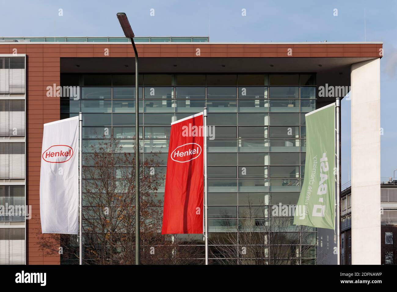 Head office of the consumer goods manufacturer Henkel, flags with logo,  Duesseldorf-Holthausen, North Rhine-Westphalia, Germany Stock Photo - Alamy