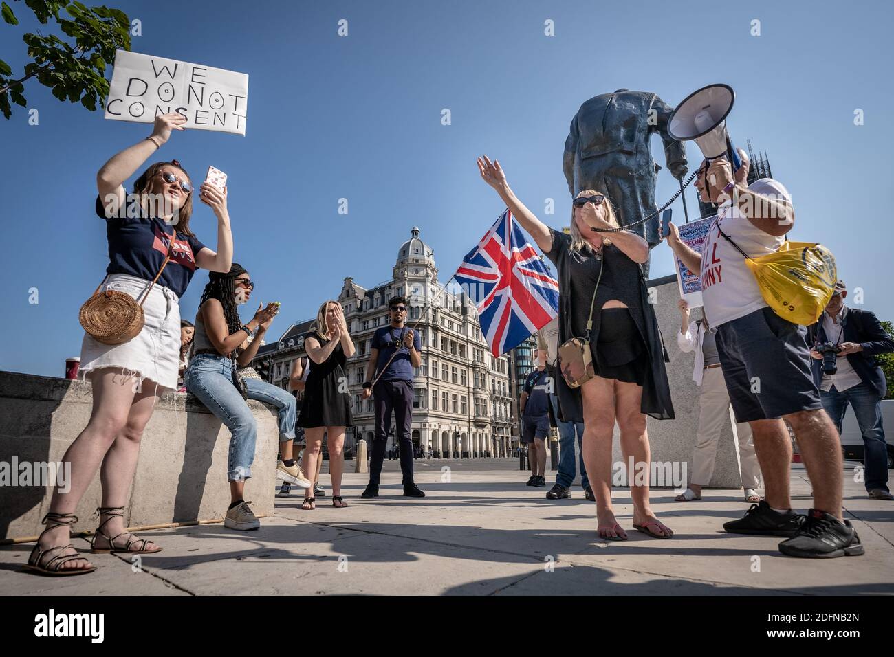 Coronavirus: Anti-Lockdown protest in Parliament Square. A small gathering of anti-lockdown protesters from Stand-Up X movement gather in the square. Stock Photo