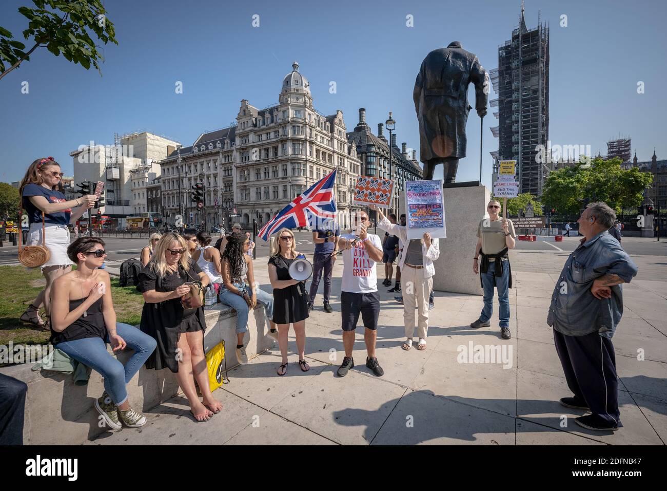 Coronavirus: Anti-Lockdown protest in Parliament Square. A small gathering of anti-lockdown protesters from Stand-Up X movement gather in the square. Stock Photo