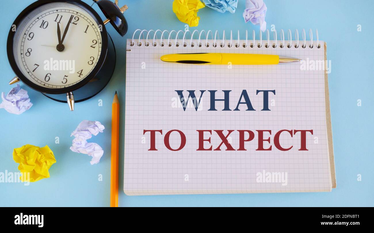 Handwriting Text Writing What To Expect Concept Meaning Asking About Regard Something As Likely To Happen Occur Wrinkle Paper Alarm Clock And Penci Stock Photo Alamy