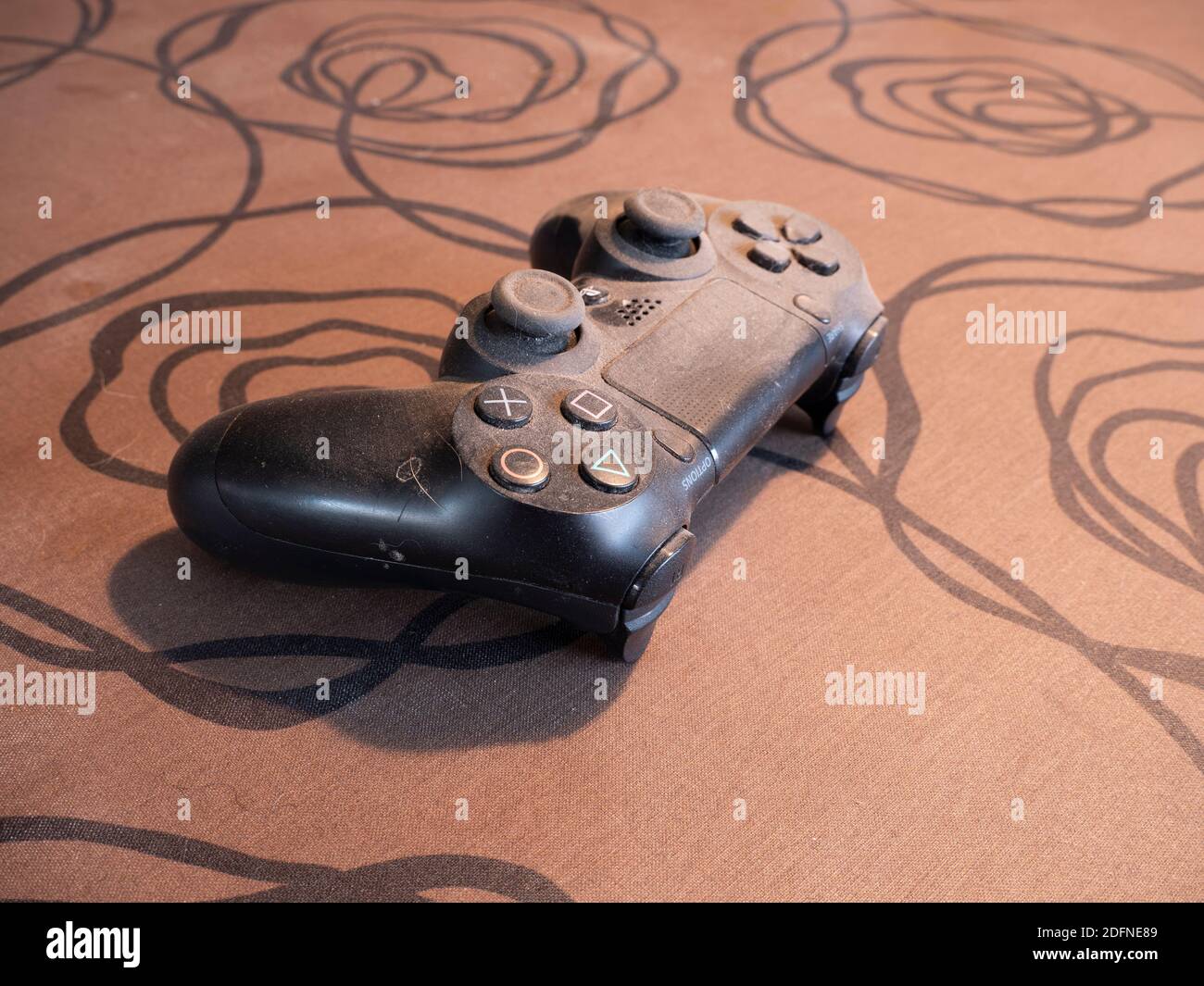 Sint Gillis Waas, Belgium, November 25, 2020, old dirty Playstation  controller full of dust and hair Stock Photo - Alamy